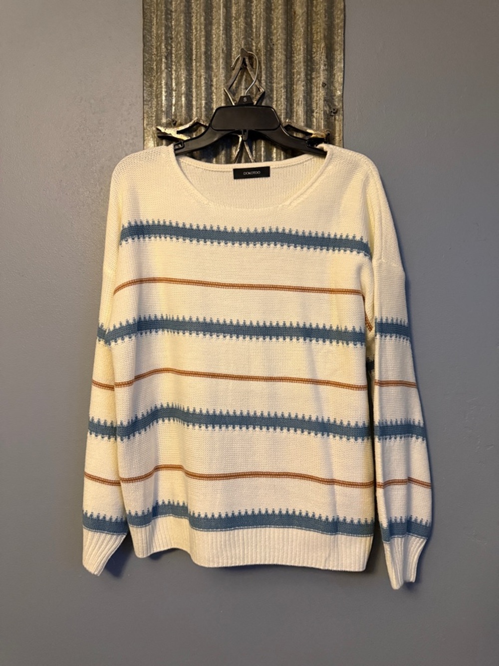 Boxy Cream Crewneck Sweater with Blue and Brown Stripe Detail